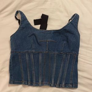 Jean crop top tank top with ties in the back and zip up.